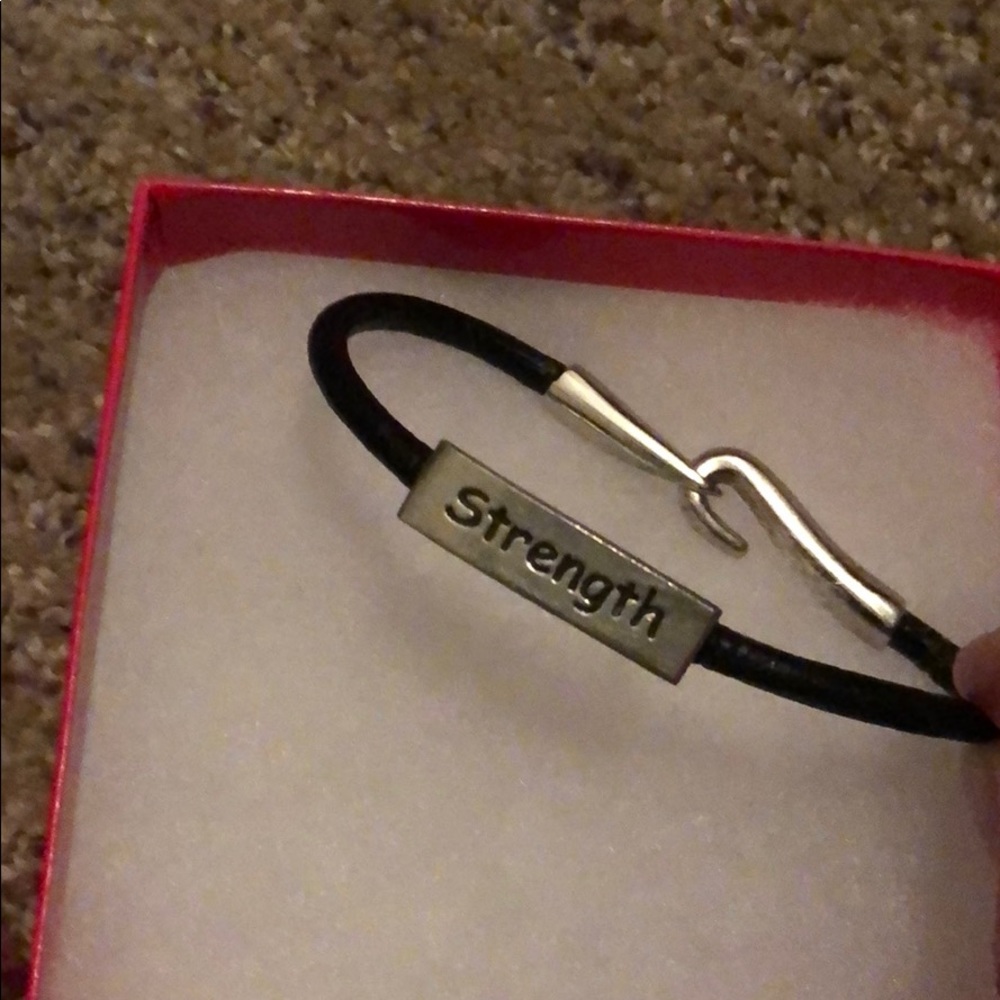 NWOT Real Pewter bracelet with “strength” engraved